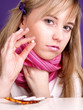woman is taking a pill