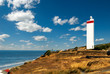 Lighthouse on the beach of ocean