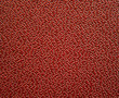 Macro background showing air holes in leather