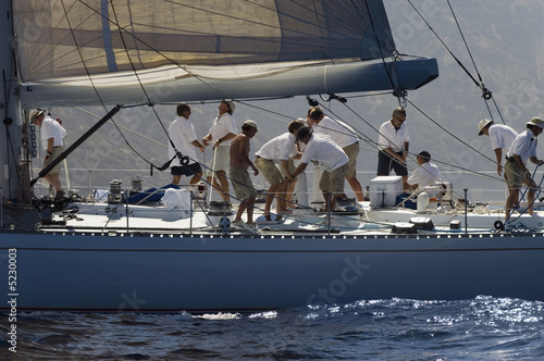 Photo: Sailboat and Crew During Race Sailboat and Crew During Race