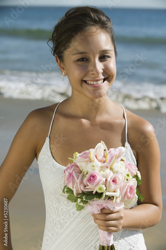 Photo: Bride on Beach With Bouquet Bride on Beach With Bouquet