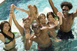 Photo: Group of friends in swimming pool, high angle view, portrait Group of friends in swimming pool, high angle view, portrait