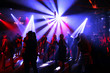 Dancing people in an underground club