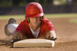 Foto: Baseball player sliding into base Baseball player sliding into base