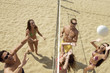 Friends Playing Beach Volleyball