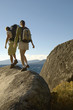 Couple Hiking on Boulders