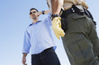 Foto: Man performing test for drink driving in front of police officer, low angle view Man performing test for drink driving in front of police officer, low angle view