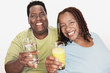 Overweight Couple holding healthy beverage, smiling, portrait