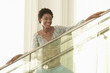 Woman Standing on Stairs
