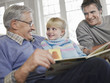 Grandfather Reading to Granddaughter
