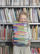 Elementary Student Reading in Library
