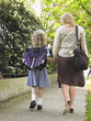 Mother Walking Daughter Home From School