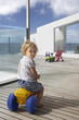 Boy Playing on Porch