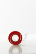 Roll of red tape in dispenser