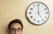Businessman Looking at Clock