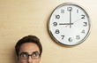 Foto: Businessman Looking at Clock Businessman Looking at Clock