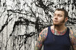 Photo: Man with tattoos. Man with tattoos.
