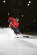 Woman playing hockey.