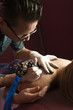 Woman getting tattoo.