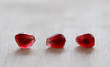 macro - three pomegranate seeds