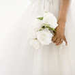 Photo: Bride holding bouquet. Bride holding bouquet.