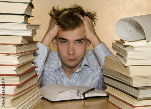 Student with textbooks  