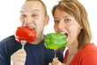 happy couple with eating  peppers