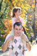 father with daughter in park