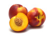 three fresh nectarines on white background