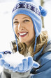 Woman with snowball.