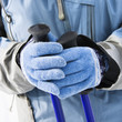 Ski gloves and poles.
