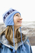 attractive smiling Caucasian blond woman with ski clothing.