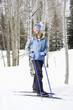 Female skier on slope.