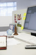 Souvenirs on Desk by computer in office