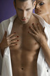 Woman embracing man, close-up, portrait