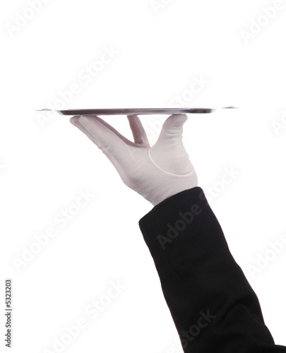 Hand holding up silver tray Hand holding up silver tray