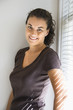 Foto: Portrait of female standing and looking at viewer. Portrait of female standing and looking at viewer.