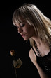 Photo: Portrait of woman with the rose Portrait of woman with the rose