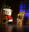 Santa reading newspaper