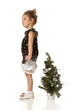 The little girl with a Christmas tree The little girl with a Christmas tree