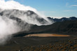Red volcano crater lake and mist. Tongariro New Zealand