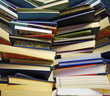 overwhelming piles of books