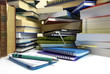 overwhelming piles of books