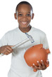 Boy with a hammer breaking a money box