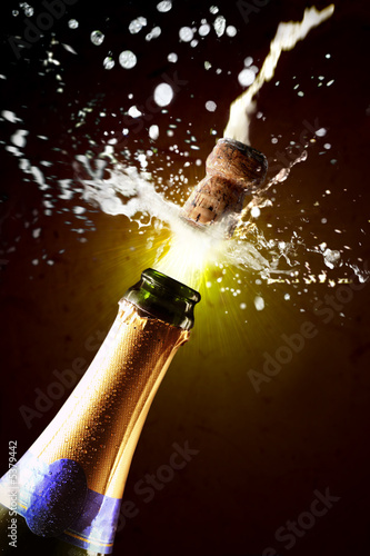 Close up of champagne cork popping