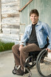 disabled man in wheelchair, smiling