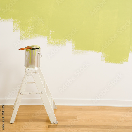 Photo: Paint can on ladder. Paint can on ladder.