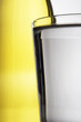 Colorful drinks on a reflective tabletop.