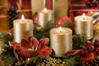 advent wreath with golden candles close up shoot