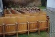 Some old defective cinema chairs in a garden. Some old defective cinema chairs in a garden.